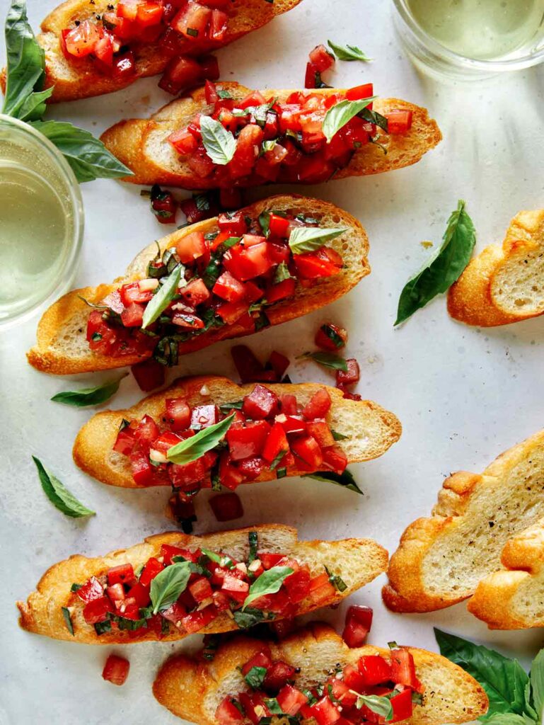 Slices of toasted bread topped with brushcetta ready to serve. 