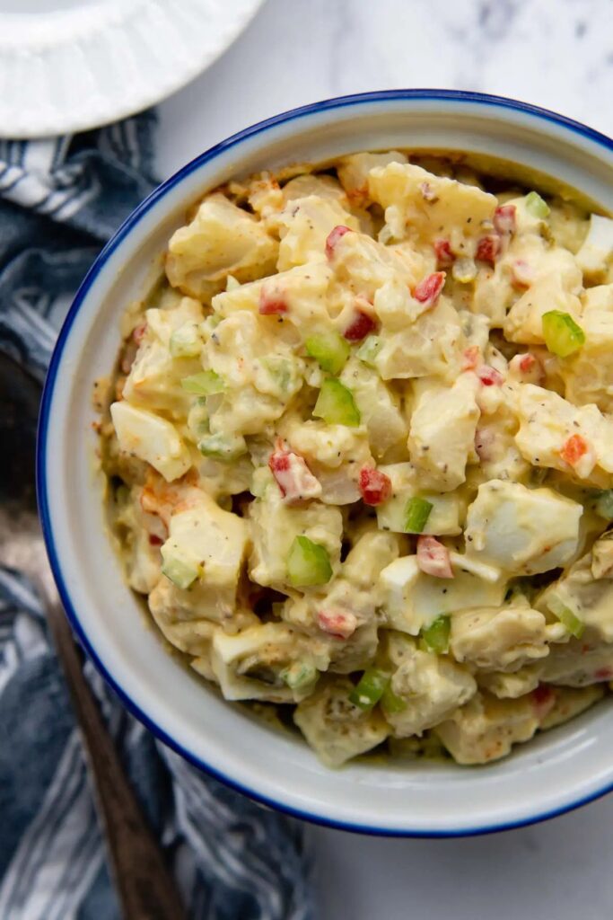 Amish potato salad in a serving bowl. 