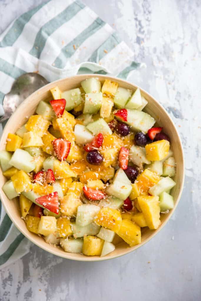 Pina colada fruit salad in a large bowl. 