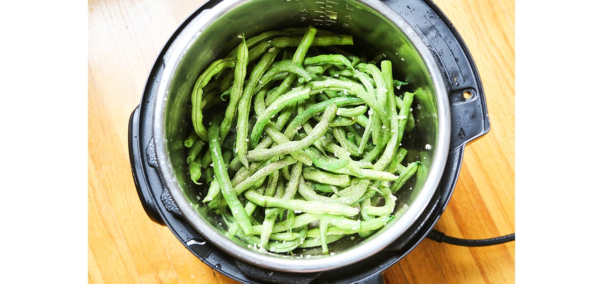 fresh green beans in an Instant Pot before cooking.