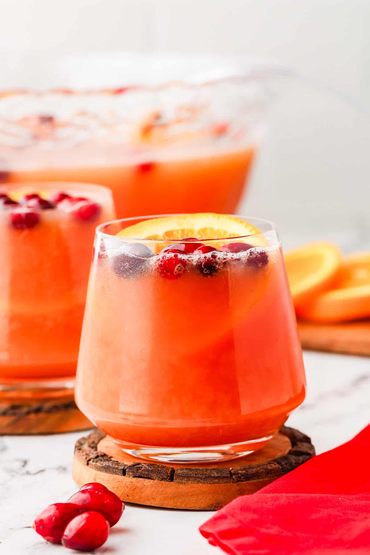 Two glasses of holiday punch in glasses.