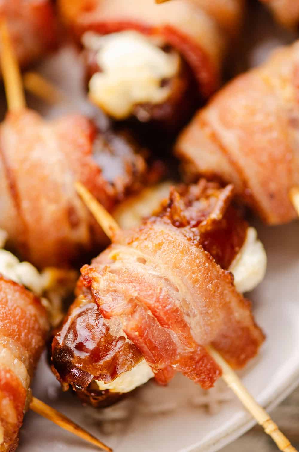 Air fryer bacon wrapped dates in a bowl. 