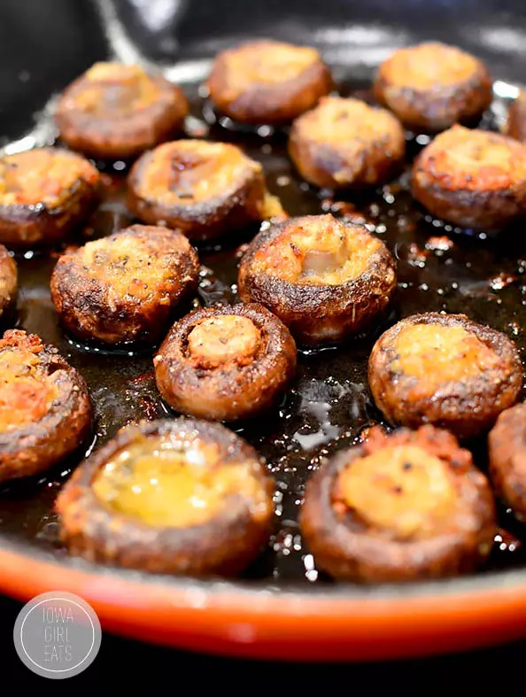Garlic butter roasted mushrooms in a pan. 