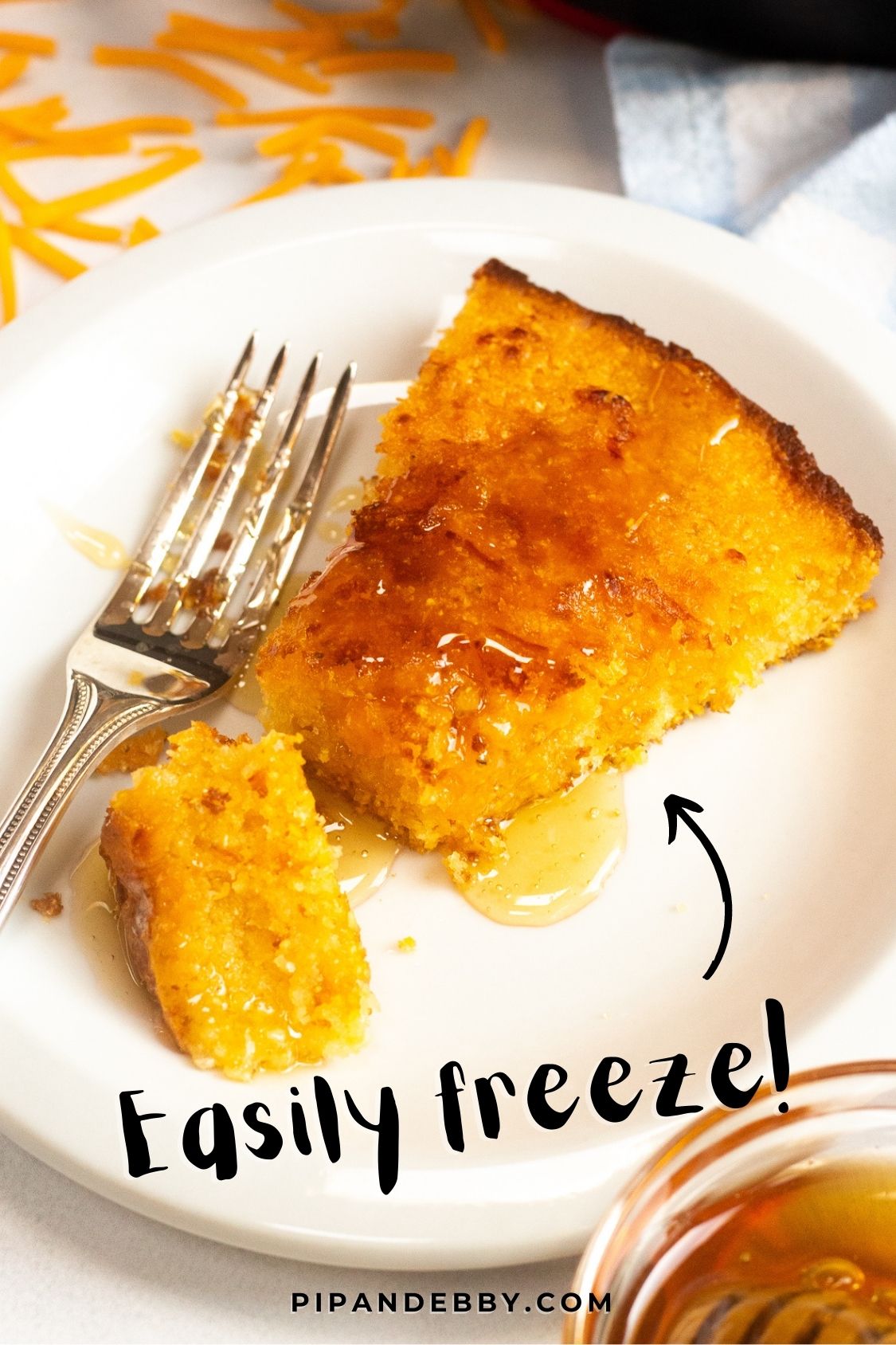 Cornbread on a plate with text overlay reading, "Easily freeze!"