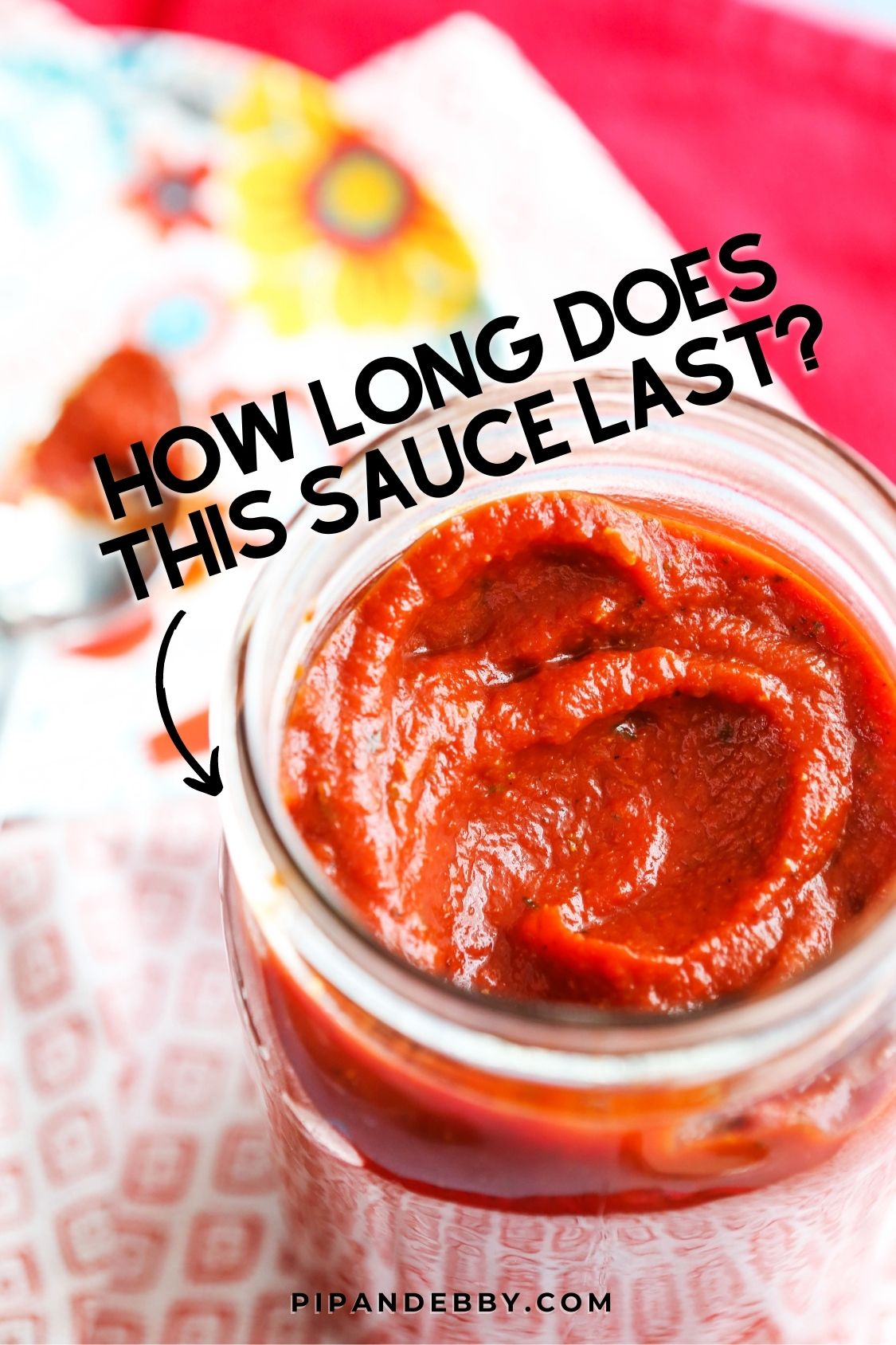 Jar of pizza sauce with text overlay reading, "How long does this sauce last?"