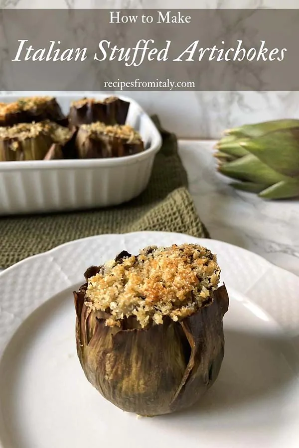 An Italian stuffed artichoke on a plate. 