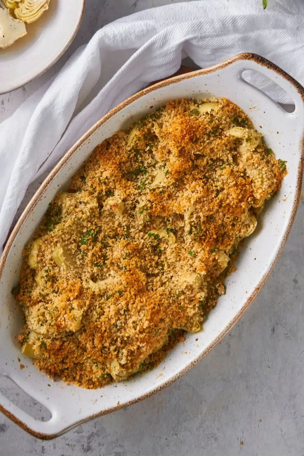 Baking dish of artichoke casserole. 