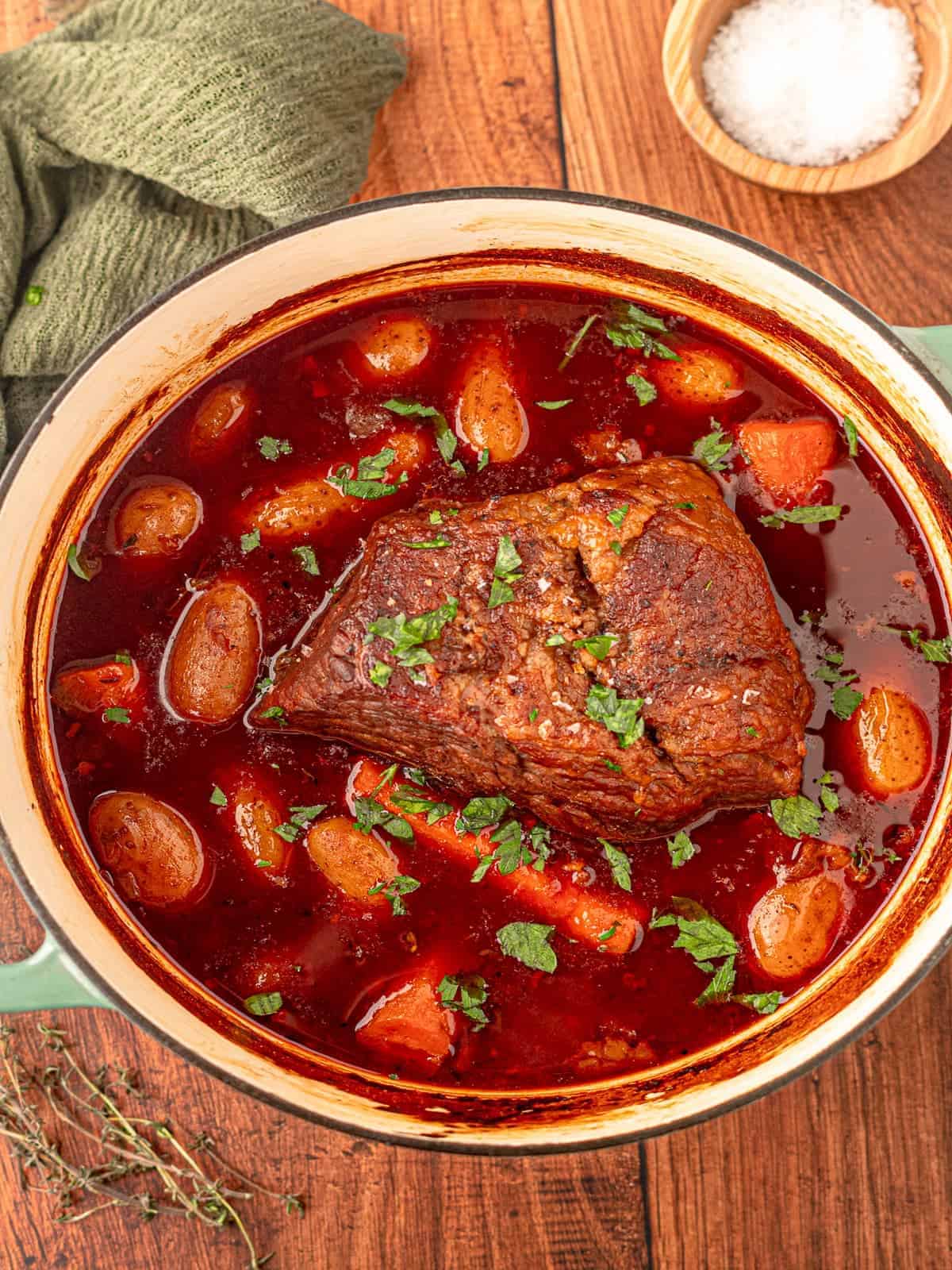 Red wine braised pot roast in a dutch oven. 