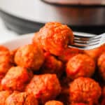 Delicious homemade meatballs served in a white bowl, perfect comfort food.