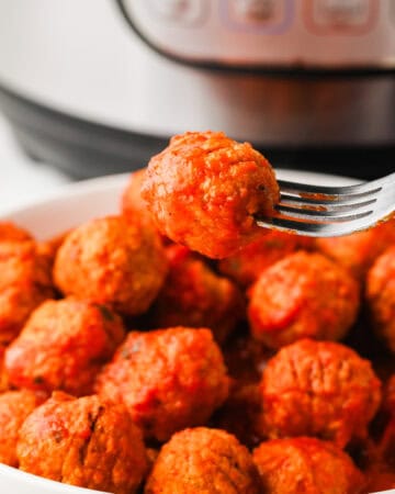 Delicious homemade meatballs served in a white bowl, perfect comfort food.
